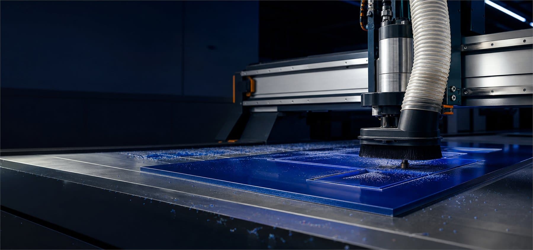 A CNC router precisely cutting a blue sheet-material part